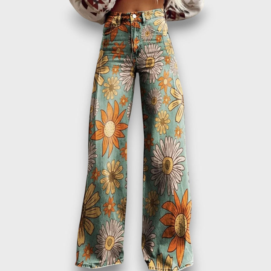 Fiorella – Jeans a gamba larga con stampa floreale retrò